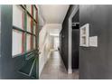 Hallway with green door, tile floor and staircase at 5696 Kingsport Dr # 3, Atlanta, GA 30342