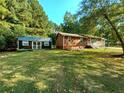 House and yard with storage shed at 88 Parkway Circle, Villa Rica, GA 30180