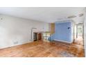 Large living room with hardwood floors and a view to the upper floor at 3664 Broadview Ct, Decatur, GA 30032