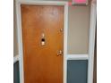 Apartment entry with wood door, security system, and modern door handle at 375 Ralph Mcgill Blvd # 505, Atlanta, GA 30312