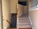 Inviting entryway with staircase and hardwood flooring at 1036 Palmer Rd, Lithonia, GA 30058