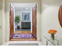 Elegant entryway with hardwood floors and artwork at 2500 Peachtree Nw Rd # 405S, Atlanta, GA 30305