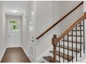 Bright entryway with stairs and hardwood floors at 4965 Whiteoak Se Walk # 19, Smyrna, GA 30080