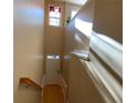 Interior view of a staircase with light-colored walls and wooden railing at 6148 Indian Wood Se Cir, Mableton, GA 30126