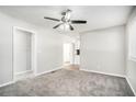 Spacious living room with neutral walls and ceiling fan at 2623 Rex Sw Ave, Atlanta, GA 30331