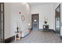 Building hallway with seating area and elevator access at 360 Chambers St # 151, Woodstock, GA 30188