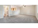 Spacious living room featuring neutral walls and carpeting at 4649 Big Valley Ct, Stone Mountain, GA 30083
