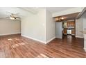 Open concept kitchen with stainless steel appliances and wood cabinets at 1868 Longdale Dr, Decatur, GA 30032
