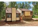 Rear exterior view of a charming two-story house at 366 Montgomery Pl, Jonesboro, GA 30238