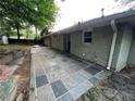 Large flagstone patio in the backyard at 2334 Elmwood Se Dr, Atlanta, GA 30339