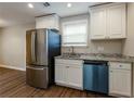 Kitchen with stainless steel appliances and granite countertops at 2911 Glenwood Se Ave, Atlanta, GA 30317