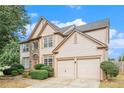 Two-story house with stone accents and a two-car garage at 3617 Myrtlewood Court Nw W, Kennesaw, GA 30144