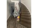 Curved staircase with carpeted steps at 6354 Shannon Pkwy # 12F, Union City, GA 30291