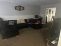 Spacious living room with sectional sofa at 6354 Shannon Pkwy # 12F, Union City, GA 30291