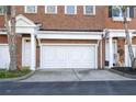 White double garage door in front of townhouse at 1275 W Spring St, Smyrna, GA 30080