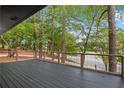 Spacious deck offering scenic views of trees and neighborhood at 2228 Old Dallas Sw Rd, Marietta, GA 30064