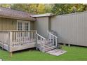 Back deck with stairs leading to the backyard at 3225 Fern Dr, Tucker, GA 30084