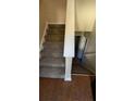 Indoor carpeted stairs leading to upper level at 5300 Forest Downs Ln, Atlanta, GA 30349
