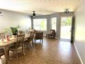 Bright dining area with tile floors at 345 Meadows Ln, Canton, GA 30114
