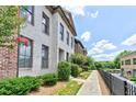 Brick building exterior with sidewalk and landscaping at 3517 Village Park Nw Way, Kennesaw, GA 30144