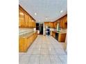 Kitchen with granite countertops and stainless steel appliances at 2735 Sandy Creek Cir, Loganville, GA 30052