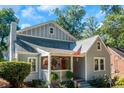 Gray house with red door and landscaping at 1688 Richland Sw Rd, Atlanta, GA 30311