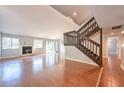 Spacious living room with hardwood floors and a fireplace at 4650 Heather Ct, Union City, GA 30291