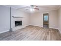 Living room with fireplace and hardwood floors at 1507 Hillside Se Dr, Conyers, GA 30094