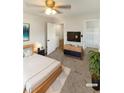 Virtually staged bedroom with a walk-in closet and neutral decor at 4060 Willowmere Pointe Nw, Kennesaw, GA 30144