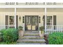 Inviting front entrance with double doors and stone steps at 5530 Aven Rd, Marietta, GA 30068