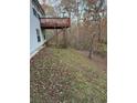 Elevated deck overlooking wooded area at 220 Lancaster Way, Hiram, GA 30141