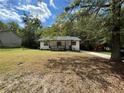 Newly renovated single-story home with a landscaped yard and walkway at 8165 Thompson St, Douglasville, GA 30134