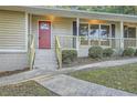 Front door entrance with steps and walkway at 443 Creekwood Pass, Dallas, GA 30157