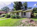 Brick house with a large yard and mature trees at 2895 Springfield Ct, Atlanta, GA 30349