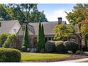 Charming brick home with lush landscaping and a spacious yard at 1273 Oakdale Ne Rd, Atlanta, GA 30307