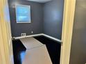 Bedroom with dark hardwood floors and gray walls at 207 Howell Dr, Atlanta, GA 30331