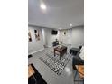 Finished basement features a living area, bedroom, and kitchenette at 818 Lee Andrews Ave, Atlanta, GA 30315