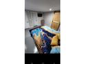 Basement bedroom with a modern aesthetic and lots of natural light at 818 Lee Andrews Ave, Atlanta, GA 30315