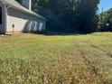 Grass yard beside the house at 5606 Rockingwood Ct, Atlanta, GA 30349