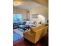 Spacious living room with hardwood floors and comfy furniture at 2555 Flat Shoals Rd Apt # 3305, College Park, GA 30349