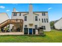 Two-story house with deck, patio, and fenced backyard at 1812 Beckley Nw Pl, Kennesaw, GA 30152