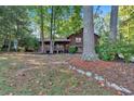 Two-story house with wood siding, deck, and landscaping at 1981 Brannon Way, Lithia Springs, GA 30122