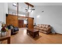 Living room with hardwood floors and vaulted ceilings at 5934 S Deshon Ct, Lithonia, GA 30058