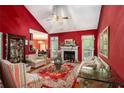 Bright living room with hardwood floors, fireplace, and access to the backyard at 2797 Club Forest Dr, Conyers, GA 30013