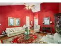 Spacious living room featuring hardwood floors, a large window, and a cozy seating area at 2797 Club Forest Dr, Conyers, GA 30013