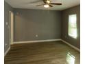 Spacious living room with hardwood floors and ceiling fan at 890 Mcwilliams Se Rd, Atlanta, GA 30315