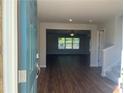 Bright entryway with hardwood floors and view of living room at 3271 Forest Green Dr, Douglasville, GA 30135