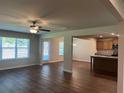 Open concept living and kitchen area with hardwood floors at 3271 Forest Green Dr, Douglasville, GA 30135