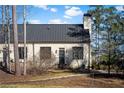 Craftsman style home with metal roof and landscaping at 377 Anders N, Chattahoochee Hills, GA 30268