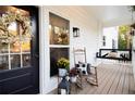 Inviting front porch with rocking chair and seasonal decor at 4619 Spring St, Acworth, GA 30101